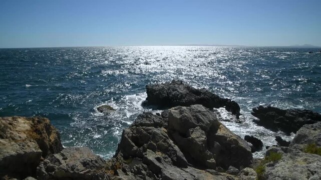 Beautiful Sunset Over Rocky Coastline &ndash; Waves Crashing on Sea Rocks