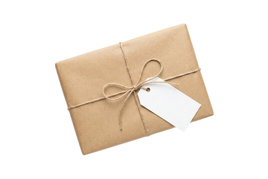 Brown paper gift package tied with twine and a blank tag. Isolated on transparent background, png