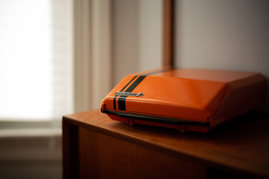 A retro orange typewriter