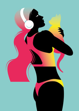 Stylish woman in a bikini with headphones holding a cat