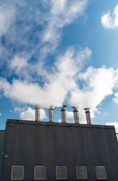 Canada, BC, Vancouver.  Steam vents atop pressure regulation structure.  Part of the River District low-carbon, steam energy system.