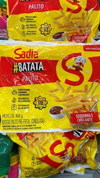 Salvador, Brazil - April 9, 2026: Packages of Sadia frozen french fries on a supermarket freezer shelf. Sadia batata palito. 