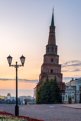 Naklejka premium The ancient leaning red brick Syuyumbike Tower at night on the territory of the Kazan Kremlin. Russia