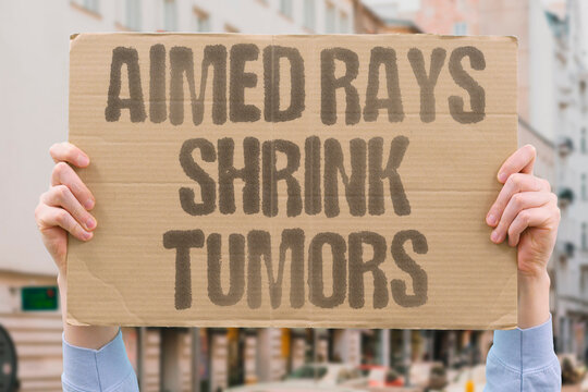 "Aimed Rays Shrink Tumors" Linear accelerators deliver targeted radiation doses to tumor sites to reduce mass and suppress cancerous cell division. CANCER. RADIATION. THERAPY. SHRINK. TUMOR.