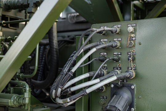 Military equipment and army equipment.. Installation and arrangement of electrical and communication wiring in vehicles. Setup of power and communication wiring systems for military vehicles