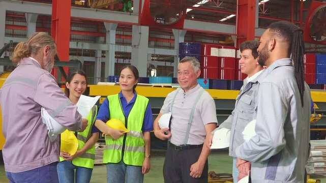 The factory supervisor delivered an inspirational speech before employees began their duties in their departments and workstations on the metal sheet production line.