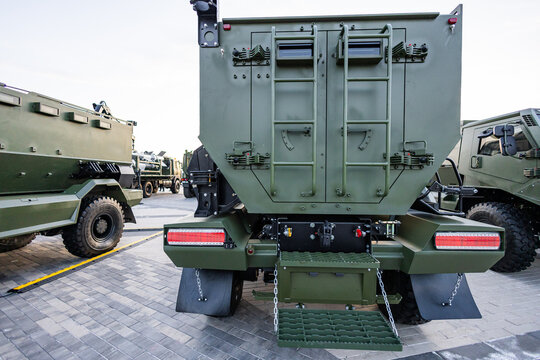 Military equipment and army equipment.. Military transport lorry viewed from behind emphasizing safety measures. Rear perspective of military freight vehicle demonstrating various protective