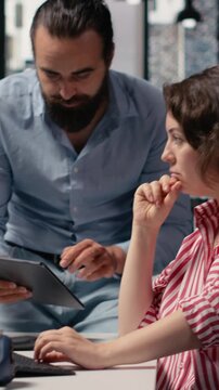 Vertical Video Team generating detailed videos of Mars and satellite with AI chatbot, using prompts on virtual assistant. Colleagues interact with artificial intelligence, generative models for solar