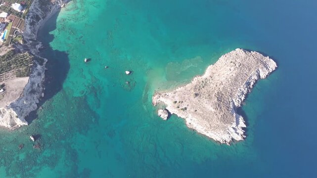 Aerial drone shot.View of famous beach in the summer, Crete, Greece. Famous beach with river and palm trees in Libyan sea. Tropical island, Panoramic view, Most beautiful beaches of Crete island