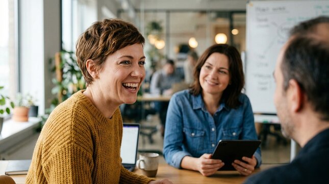 Collaborative Moment: A candid capture of a business meeting, the scene radiates warmth, engagement, and shared understanding, emphasizing communication, teamwork, and success