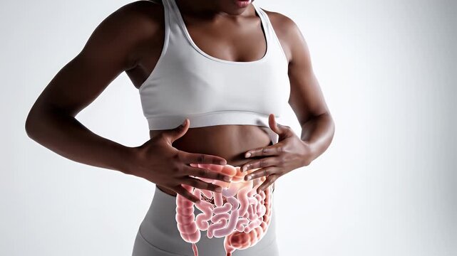 Close Up Of African Descent Woman With Glowing Digestive System Overlay Touching Lower Abdomen In Studio Setting