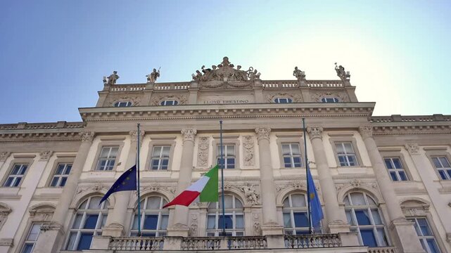 Upward perspective of Palazzo del Lloyd Triestino, 19th century building linked to maritime trade during Austro Hungarian period, in Trieste, Italy