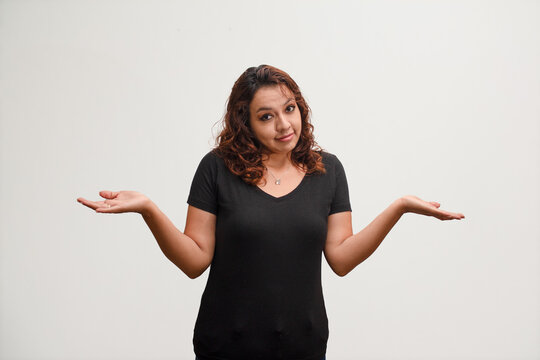 Confused Female Model Showing &ldquo;I Don&rsquo;t Know&rdquo; Body Language