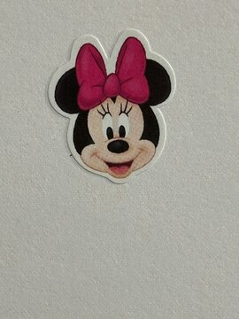 Minnie Mouse character sticker on plain background showing popular Disney cartoon icon. April 9 2026, Alberta, Canada. For editorial use only.