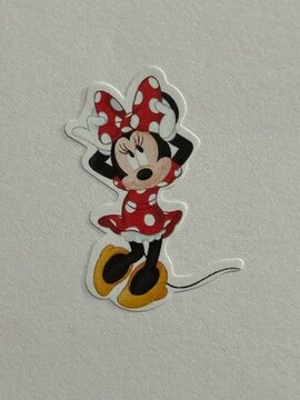 Minnie Mouse character sticker on plain background showing popular Disney cartoon icon. April 9 2026, Alberta, Canada. For editorial use only.