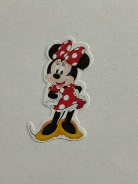 Minnie Mouse character sticker on plain background showing popular Disney cartoon icon. April 9 2026, Alberta, Canada. For editorial use only.