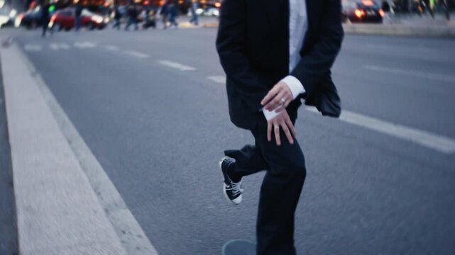 Businessman skateboarding to work in paris