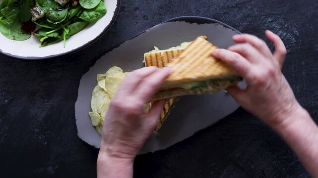 Eating a Grilled Chicken Panini 