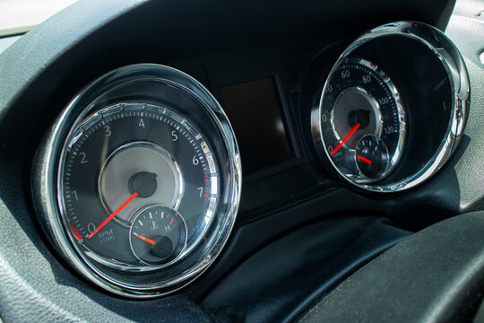 A speedometer and a tachometer displays measures a vehicle's road speed and engine RPM. High quality photo