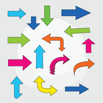 Colorful, diverse arrows pointing in various directions, on a pale backdrop