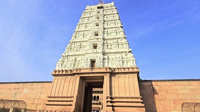 Towering gopuram of Shri Rangji Temple in Vrindavan showcasing South Indian Dravidian architecture. Sacred Hindu temple dedicated to Lord Ranganath, reflecting rich culture, devotion, and heritage.
