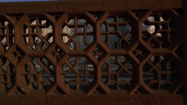 Intricate marble wall carvings and jali work at Taj Mahal, Mughal architecture with geometric patterns, arches, heritage monument showcasing Islamic art, craftsmanship and cultural tourism Agra India