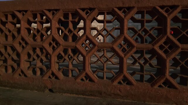 Intricate marble wall carvings and jali work at Taj Mahal, Mughal architecture with geometric patterns, arches, heritage monument showcasing Islamic art, craftsmanship and cultural tourism Agra India