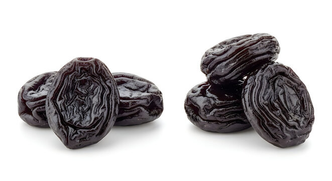 Prunes isolated on white background, heap of dried plums 

