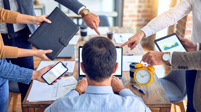 Businessman at laptop facing immense pressure and demands, with multiple hands pointing and offering tasks and tools.