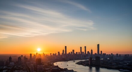 Fototapeta premium City skyline silhouetted by sunset sky over water vector illustration