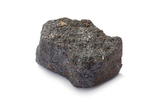 A piece of magnetite ore on white background