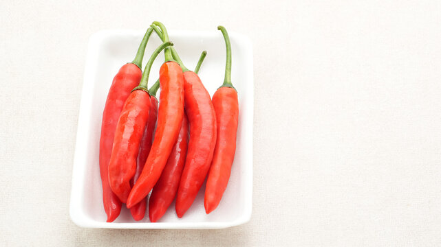 Red Chili Peppers on White Background