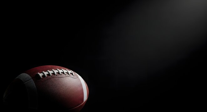 Football Action Shot, Sports Equipment, Dimly Lit Studio, Photo, Dark Environment, Close-Up View, Athletic Concept