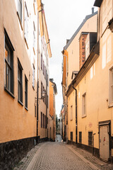 Obraz premium Gamla Stan old city in Stockholm, Sweden views of orange and yellow homes.