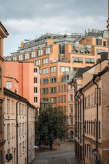 Obraz premium Gamla Stan, Stockholm old city in Sweden. Historic yellow and orange homes.