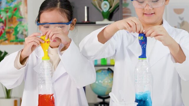 Excited Children in Lab Coats Perform Chemical Reaction Foam Experiment