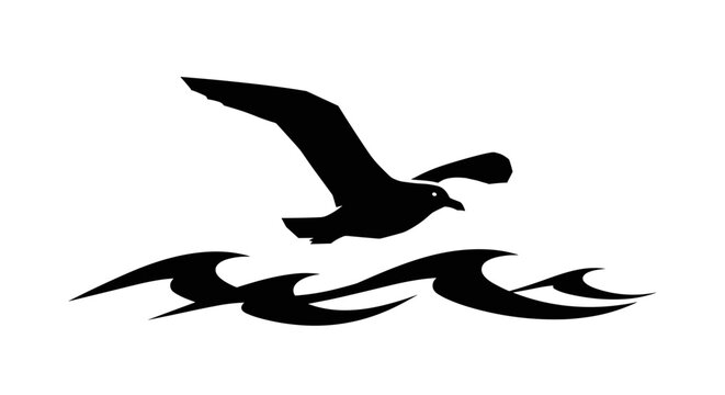 Seagull flying over ocean waves.