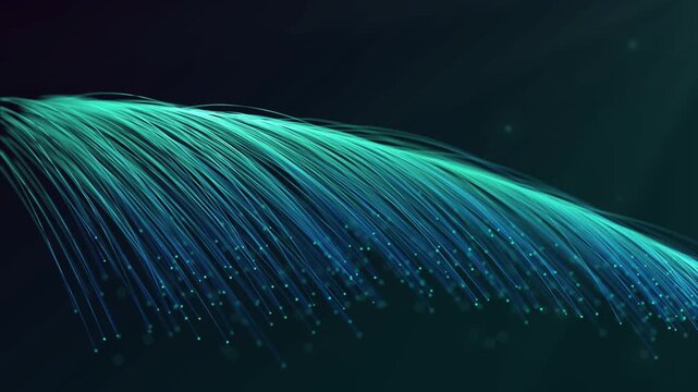A bundle of glowing blue fiber optic cables fanned out against a dark background with sparkling dots