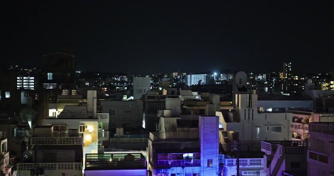 Vew from inside the car, a view of Japanese city at night