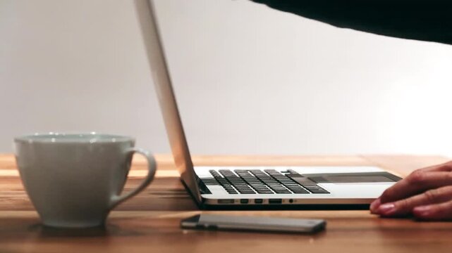Close-Up of Man Opening Laptop and Typing  Remote Work & Modern Technology Concept