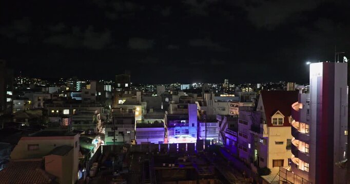 Vew from inside the car, a view of Japanese city at night