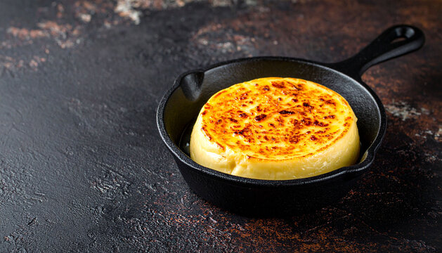 Provoleta Cheese on Rustic Dark Texture Background