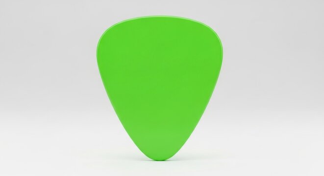 Isolated lime green guitar pick for acoustic or electric instruments, music accessories, plectrum for strumming and picking