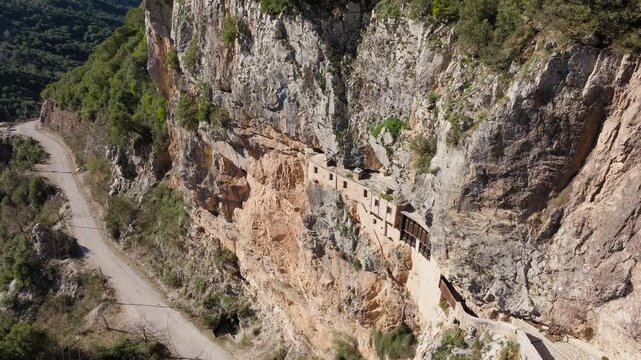 Aerial footage showcasing the stunning architecture of Holy Kipinas Monastery, integrated into the breathtaking natural landscape of Epirus