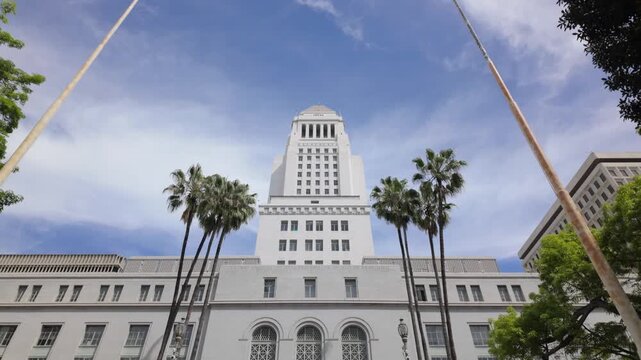 Gimbal close booming down shot of historic City Hall in downtown Los Angeles, California. 4K