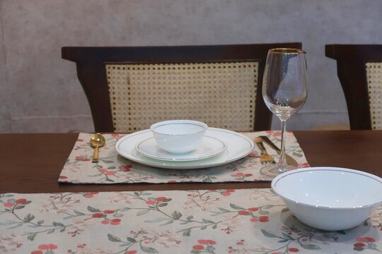 Dining table ready to serve feast	