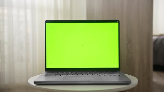 Laptop with Green Screen Dolly Zoom Shot