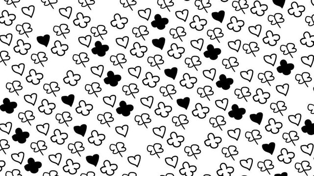 Small symbols in the form of petals and hearts move slowly across the screen.