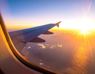 Obraz premium Aerial view of a wing, taking off during sunrise. The world outside is bathed in warm golden and orange light