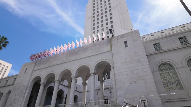 Gimbal wide booming down shot of City Hall in Los Angeles, California. 4K